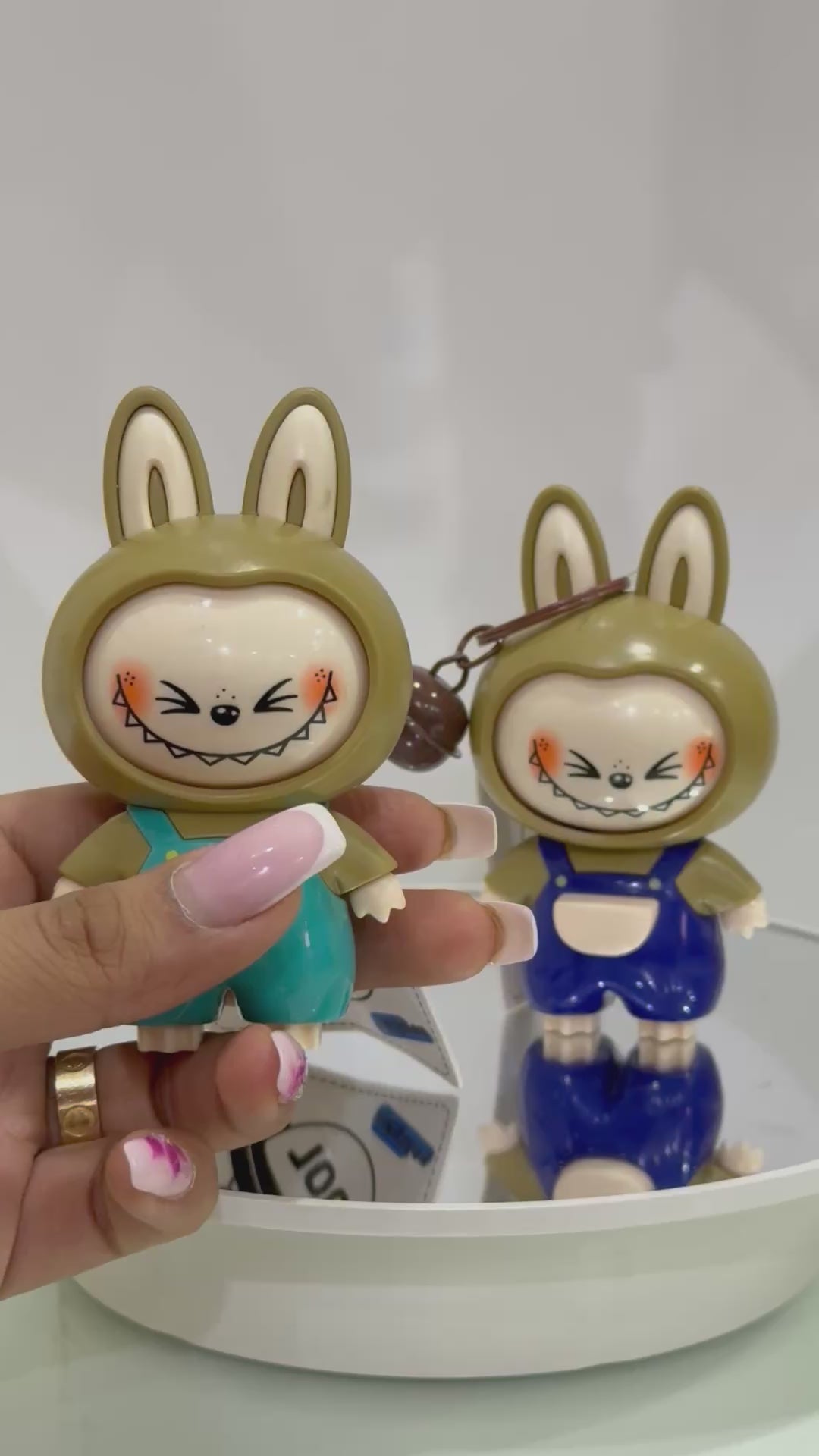 Face changing labubu charm